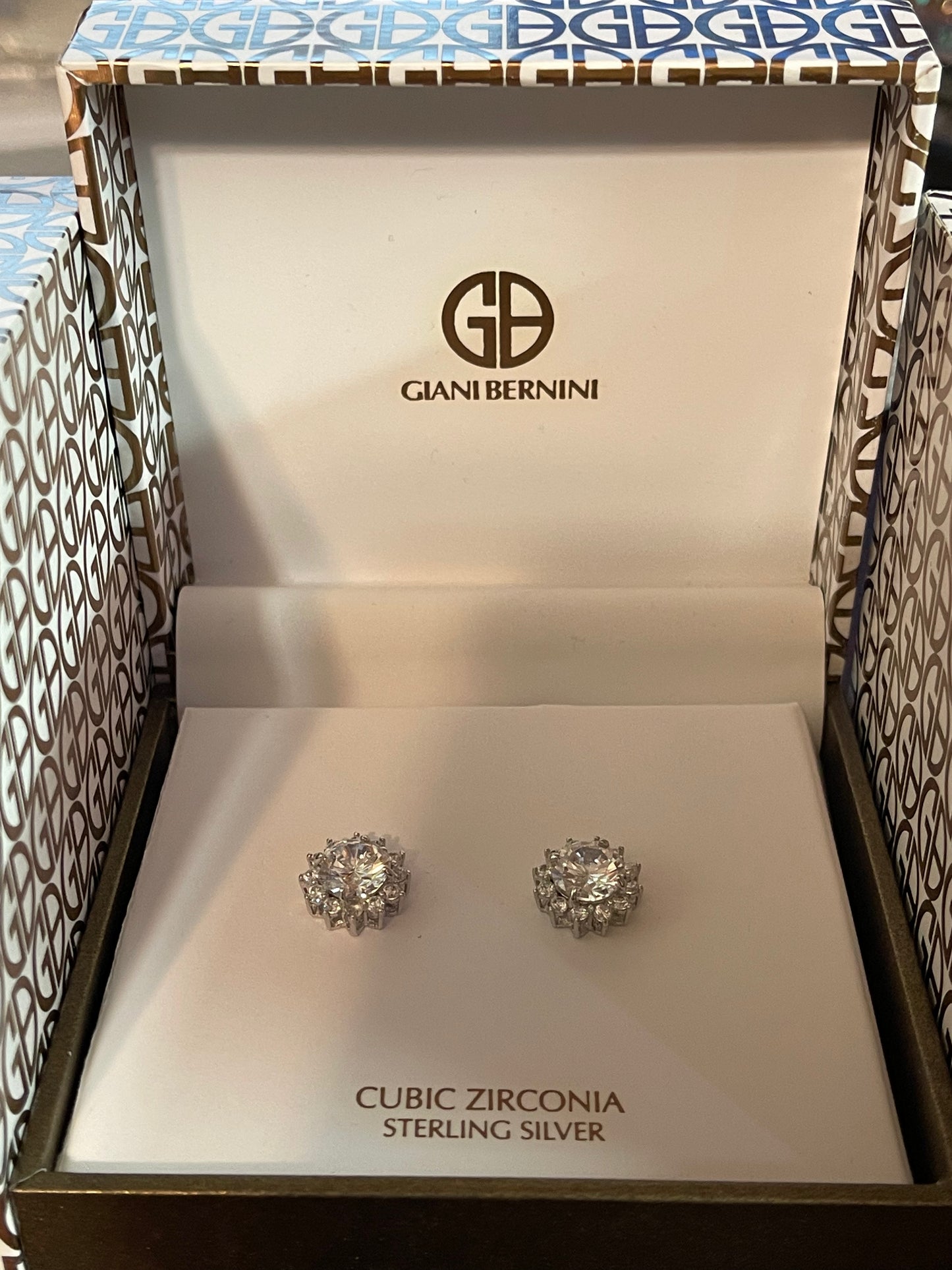 Giani Bernini Cubic Zirconia 925 Sterling Silver Starburst Stud Earrings ( Discounted: small defect ) Cannot see without magnified
